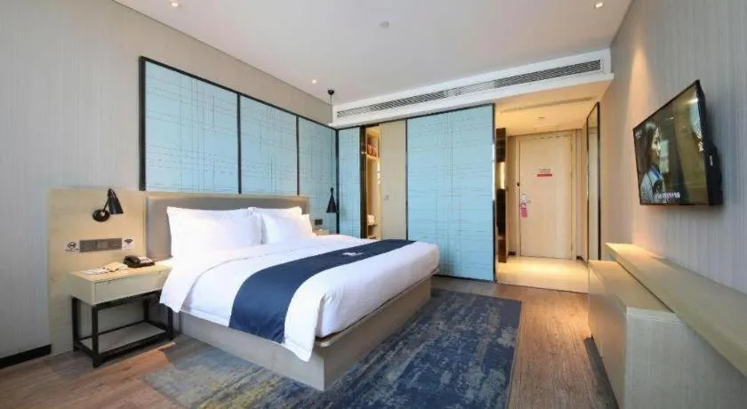 Bed in Echarm Hotel Guiyang North High-speed Railway Station