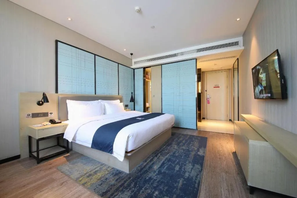 Bed in Echarm Hotel Guiyang North High-speed Railway Station