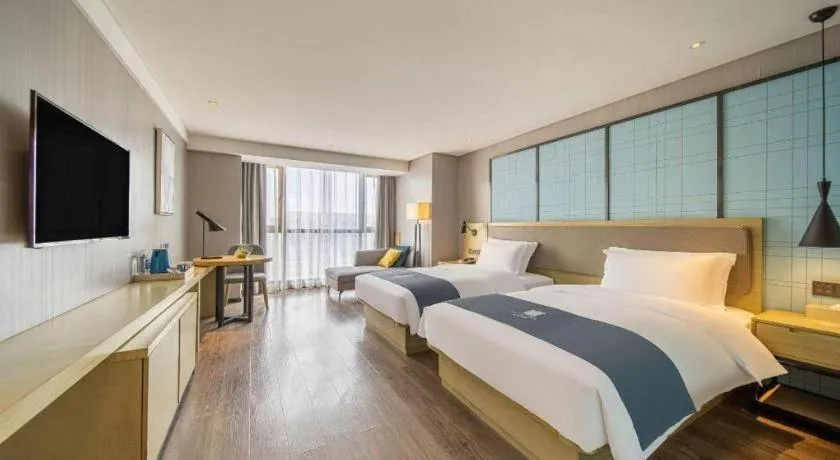 Bed in Echarm Hotel Guiyang North High-speed Railway Station