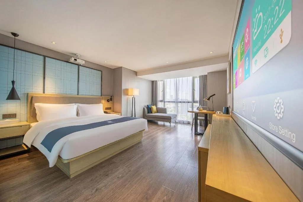 Bed in Echarm Hotel Guiyang North High-speed Railway Station