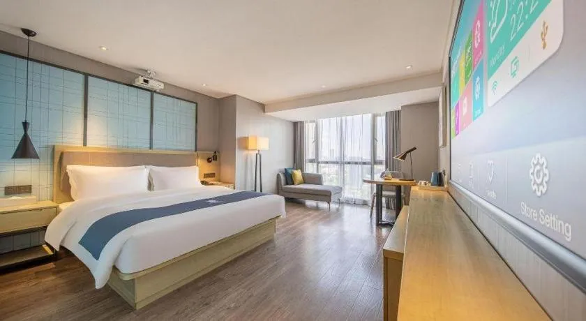 Bed in Echarm Hotel Guiyang North High-speed Railway Station