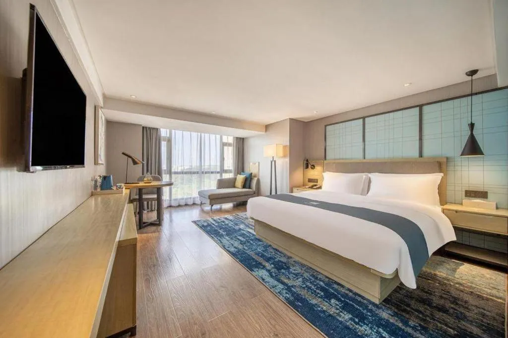 Bed in Echarm Hotel Guiyang North High-speed Railway Station