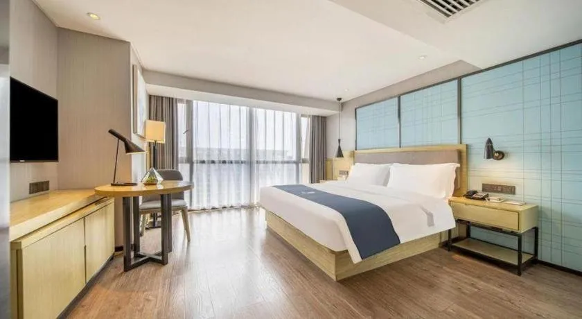 Bed in Echarm Hotel Guiyang North High-speed Railway Station