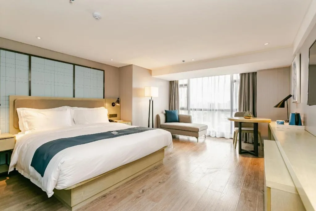 Bed in Echarm Hotel Guiyang North High-speed Railway Station