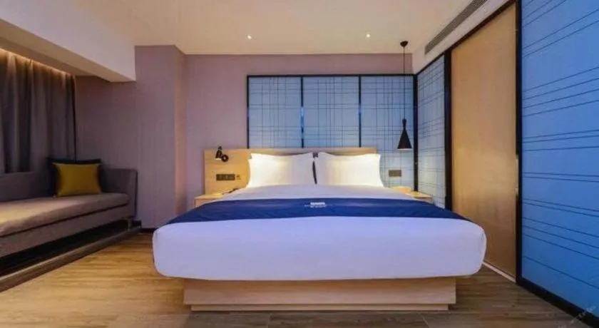 Bed in Echarm Hotel Guiyang North High-speed Railway Station