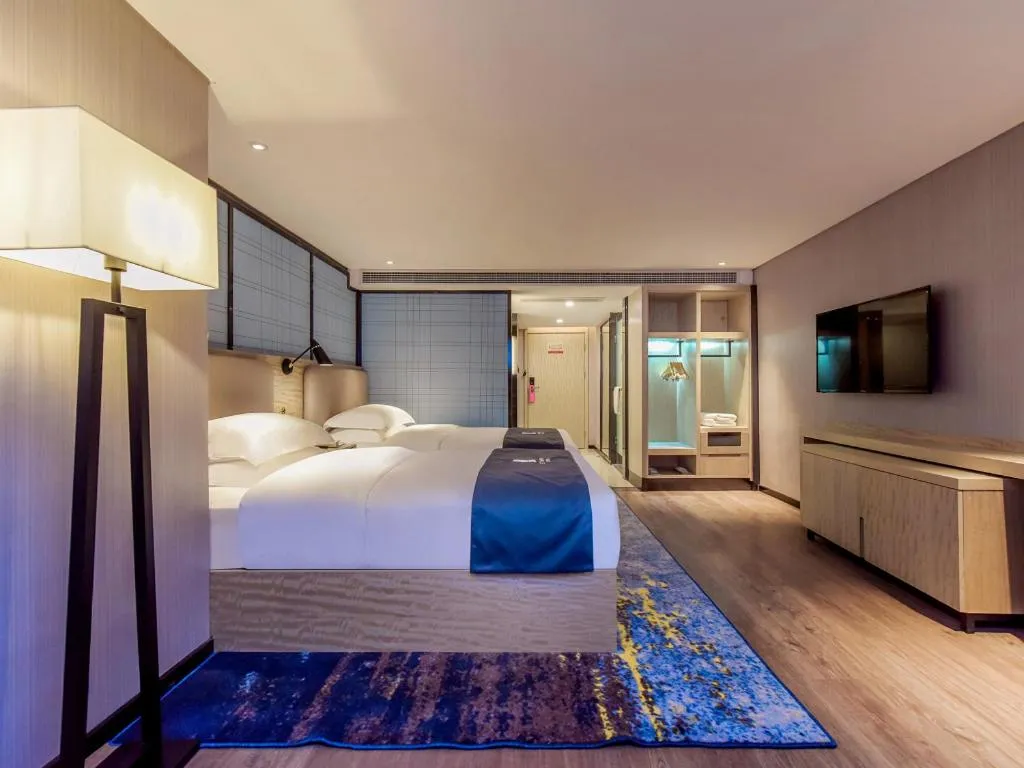 Bed in Echarm Hotel Guiyang North High-speed Railway Station