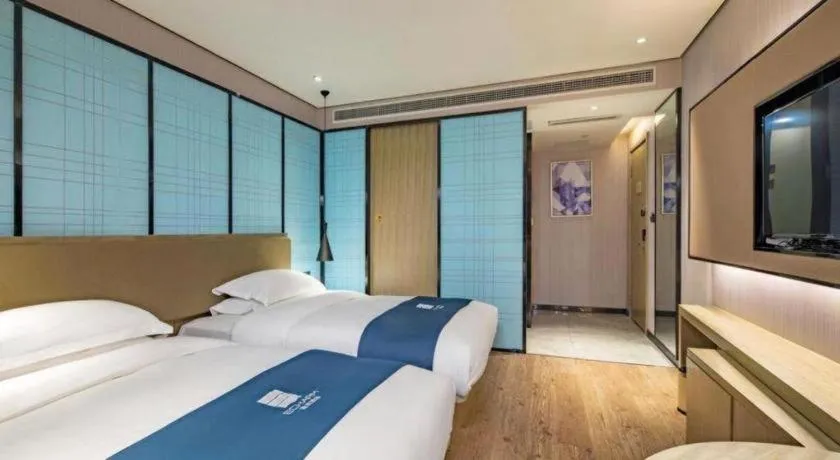 Bed in Echarm Hotel Guilin Railway Station the MixC