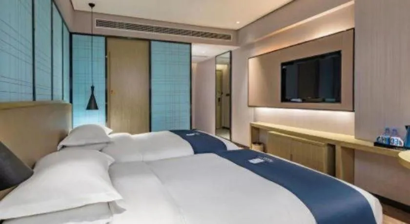 Bed in Echarm Hotel Guilin Railway Station the MixC