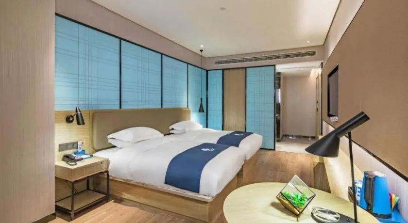Bed in Echarm Hotel Guilin Railway Station the MixC