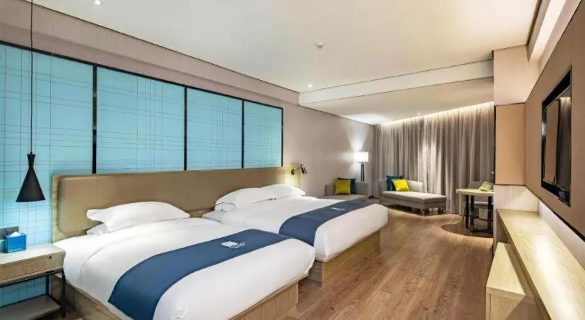 Bed in Echarm Hotel Guilin Railway Station the MixC