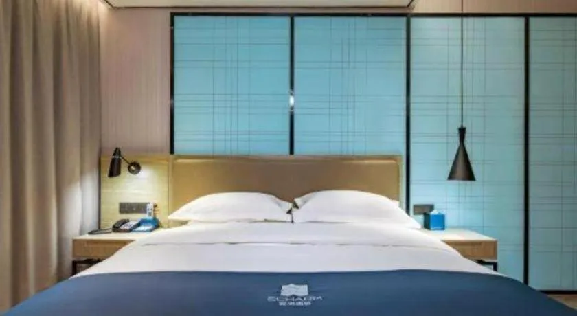 Bed in Echarm Hotel Guilin Railway Station the MixC