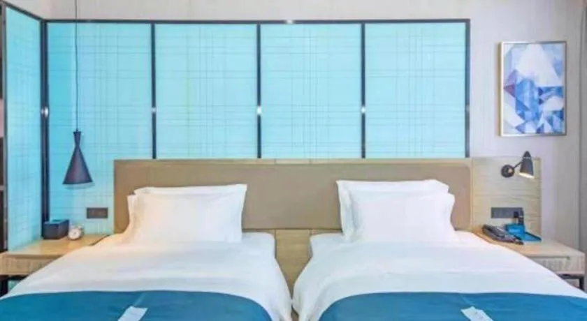 Bed in Echarm Hotel Guilin Railway Station the MixC