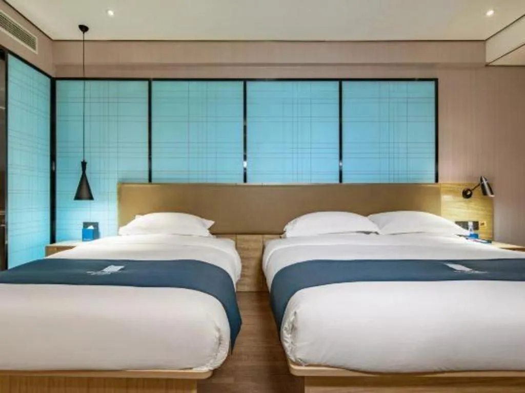 Bed in Echarm Hotel Guilin Railway Station the MixC