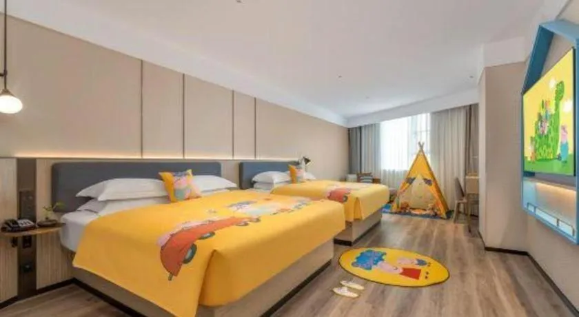 Bed in Echarm Hotel Guilin Railway Station the MixC