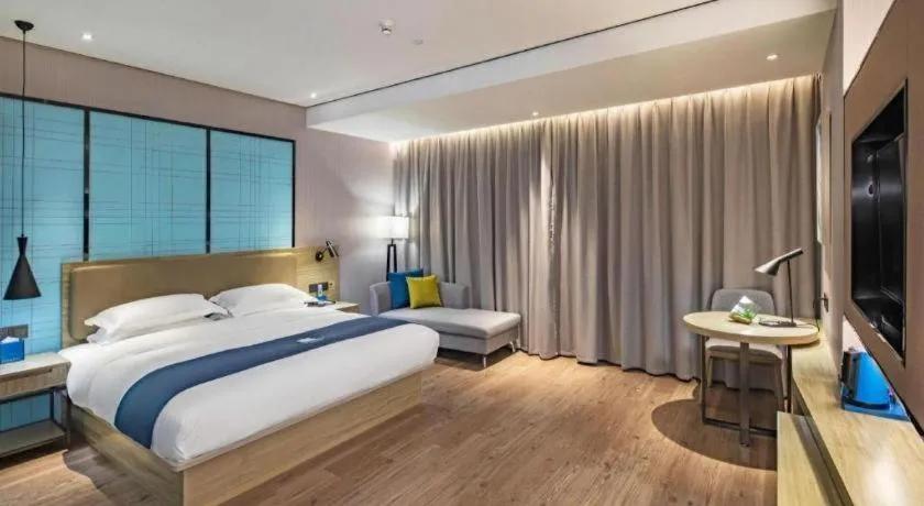 Bed in Echarm Hotel Guilin Railway Station the MixC