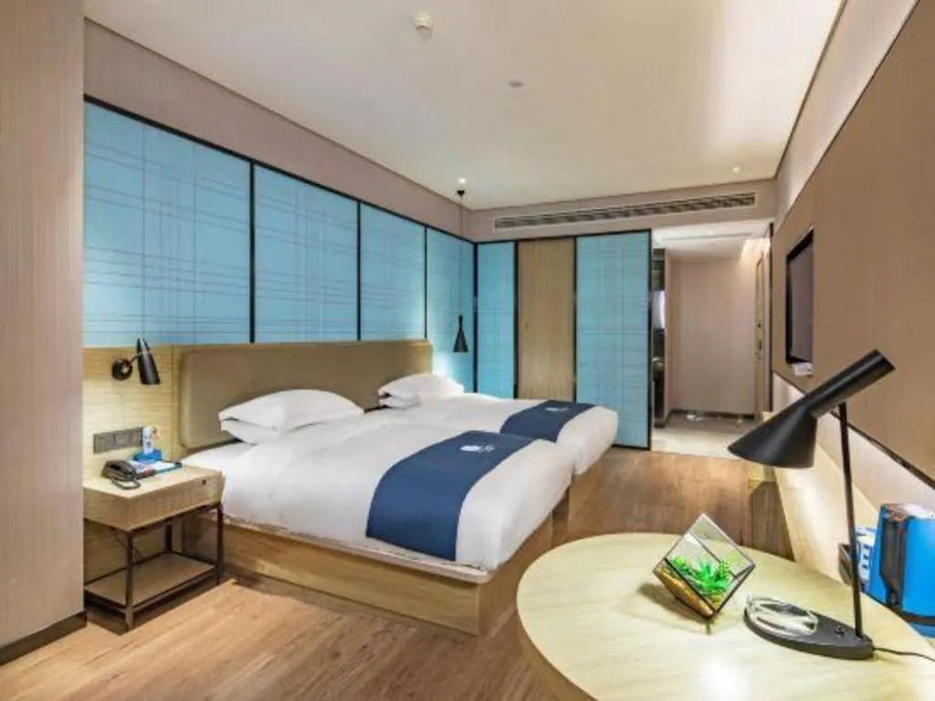 Bed in Echarm Hotel Guilin Railway Station the MixC