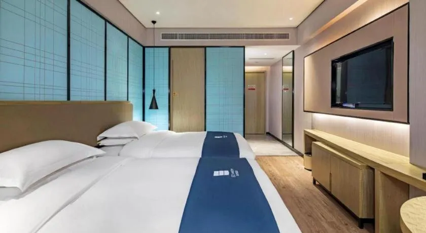 Bed in Echarm Hotel Guilin Railway Station the MixC