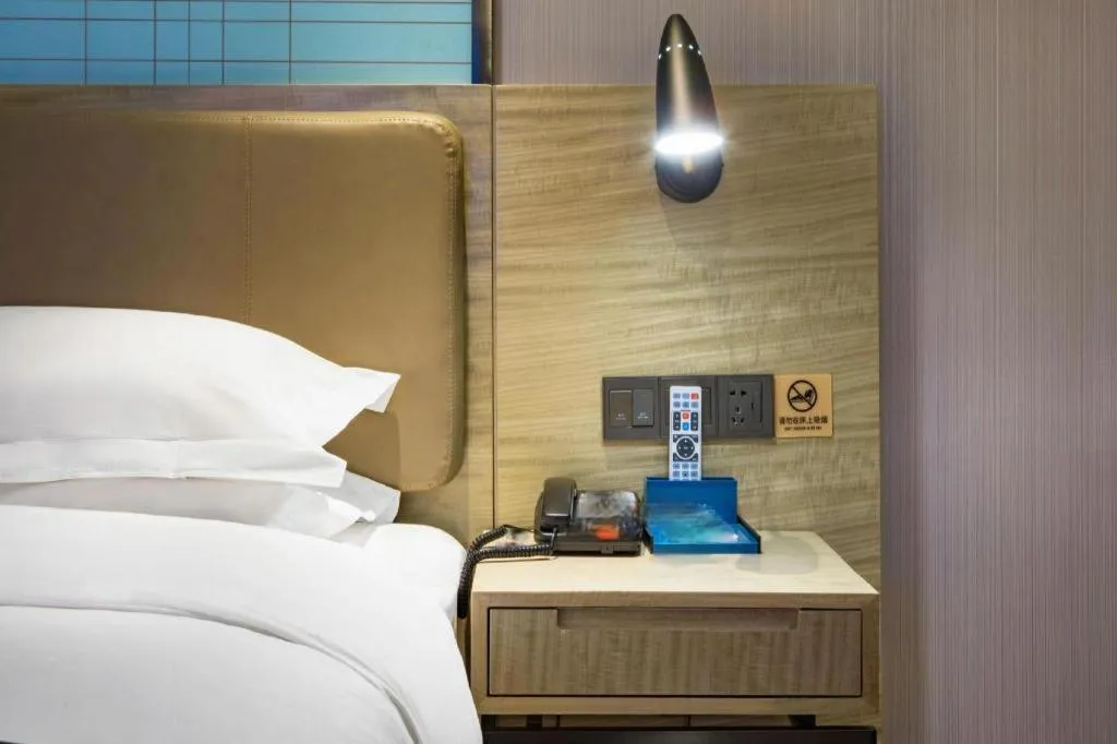 Bed in Echarm Hotel Guilin Railway Station the MixC