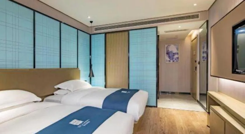 Bed in Echarm Hotel Guilin Railway Station the MixC