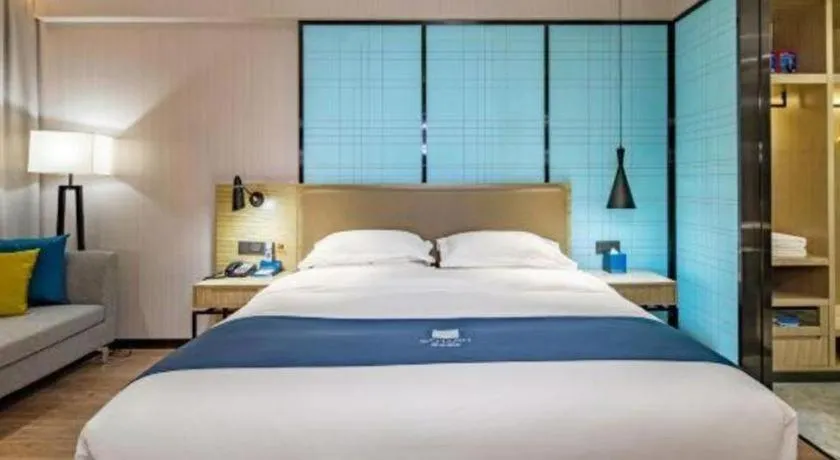 Bed in Echarm Hotel Guilin Railway Station the MixC