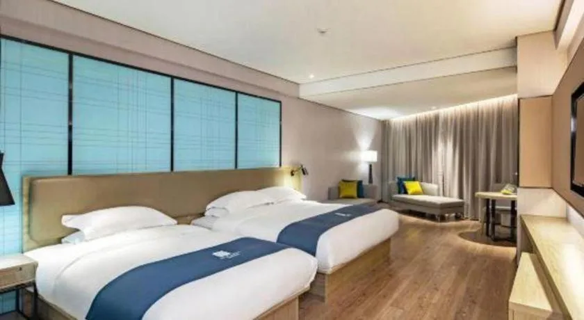 Bed in Echarm Hotel Guilin Railway Station the MixC