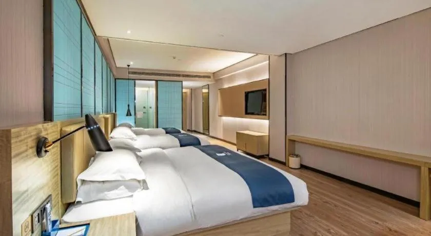 Bed in Echarm Hotel Guilin Railway Station the MixC