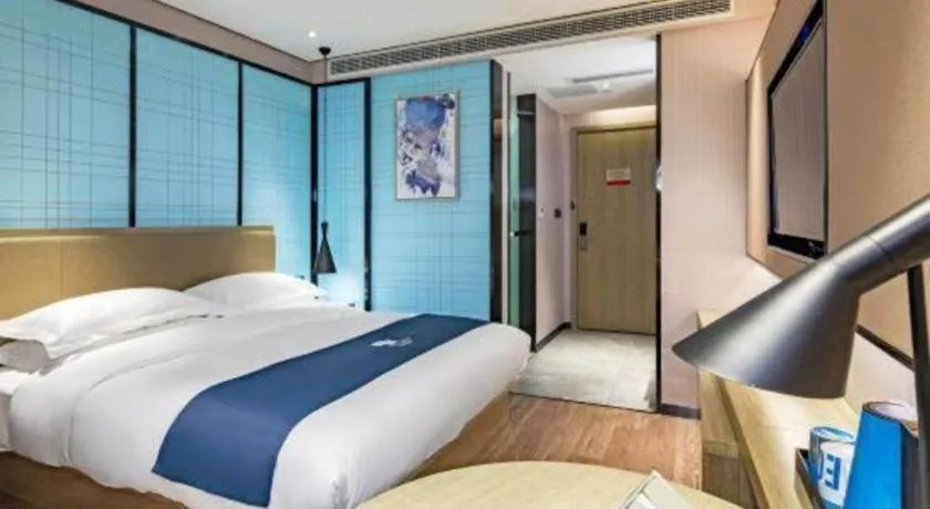 Bed in Echarm Hotel Guilin Railway Station the MixC