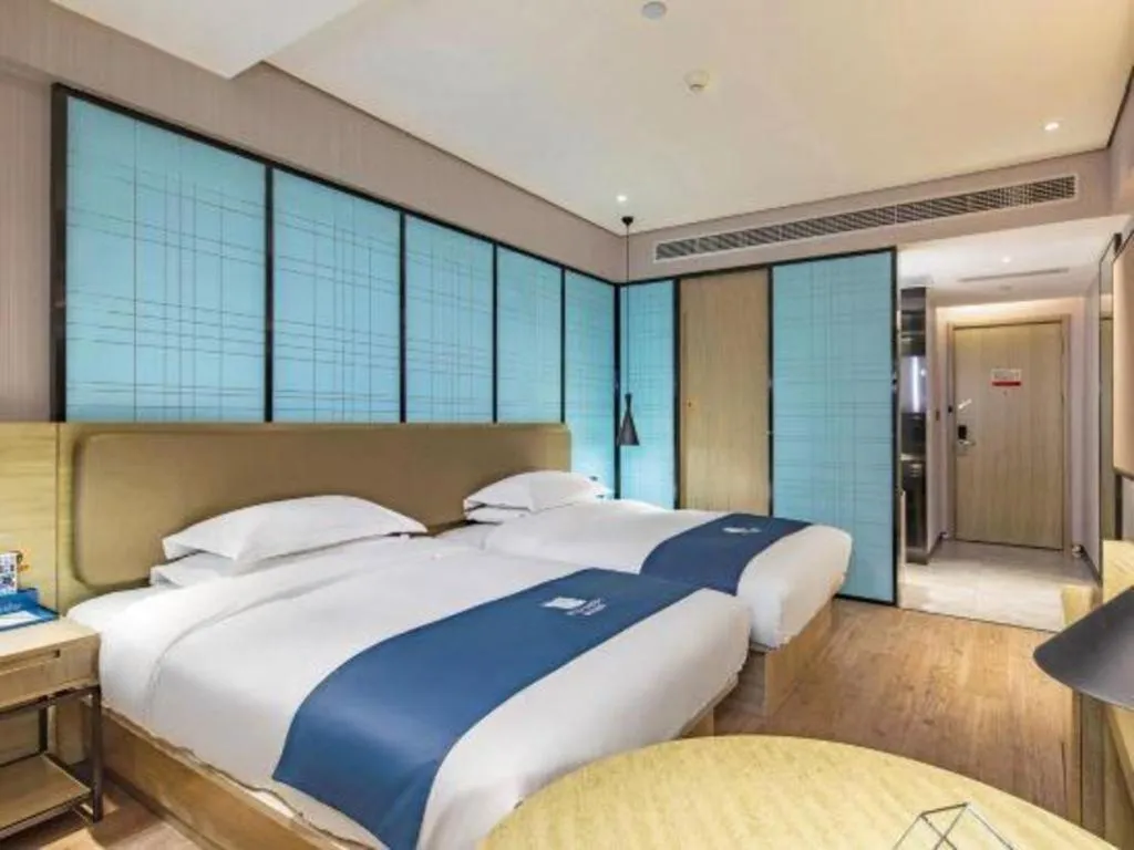 Bed in Echarm Hotel Guilin Railway Station the MixC