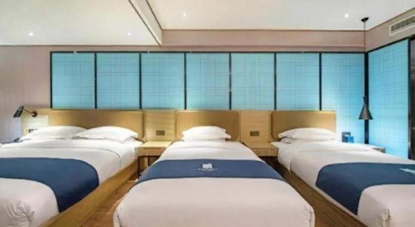 Bed in Echarm Hotel Guilin Railway Station the MixC