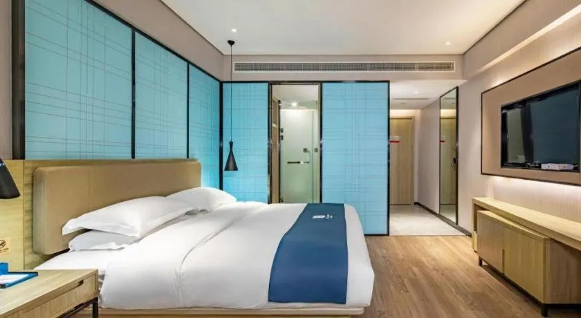 Bed in Echarm Hotel Guilin Railway Station the MixC