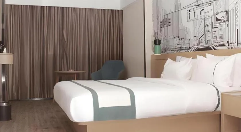 Bed in City Comfort Inn Loudi Sports Center