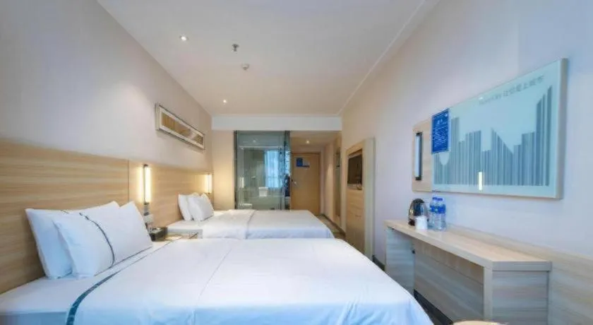 Bed in City Comfort Inn Dongguan Shilong Huixing Commercial Center