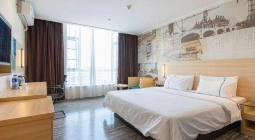 Bed in City Comfort Inn Dongguan Shilong Huixing Commercial Center