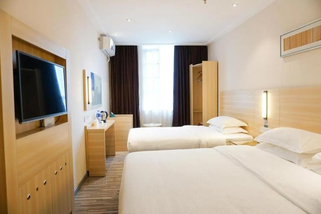 Bed in City Comfort Inn Dongguan Shilong Huixing Commercial Center