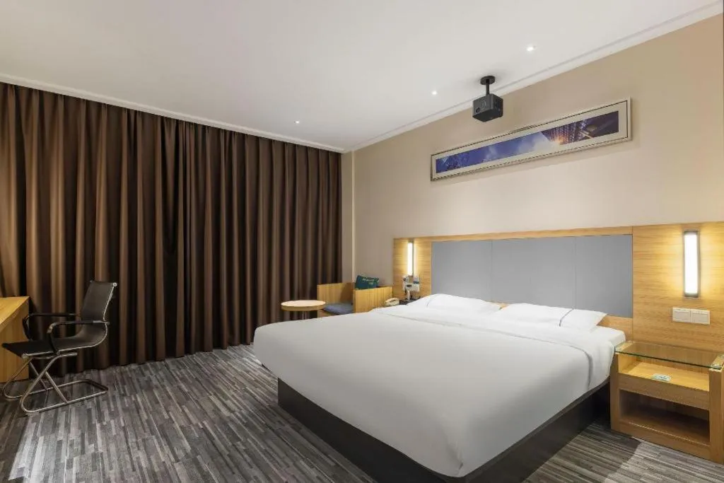 Bed in City Comfort Inn Dongguan Shilong Huixing Commercial Center