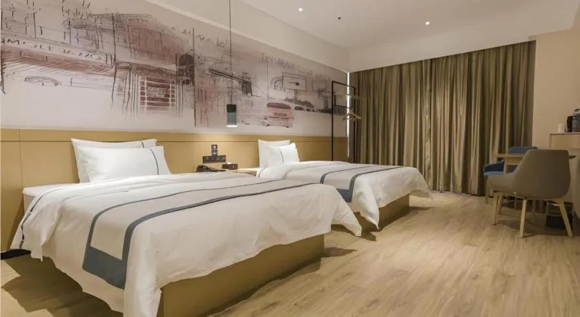 Bed in City Comfort Inn Foshan Shishan Square