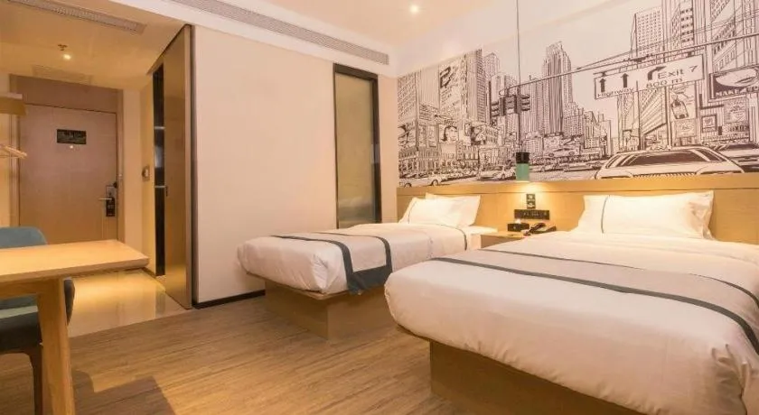 Bed in City Comfort Inn Foshan Shishan Square