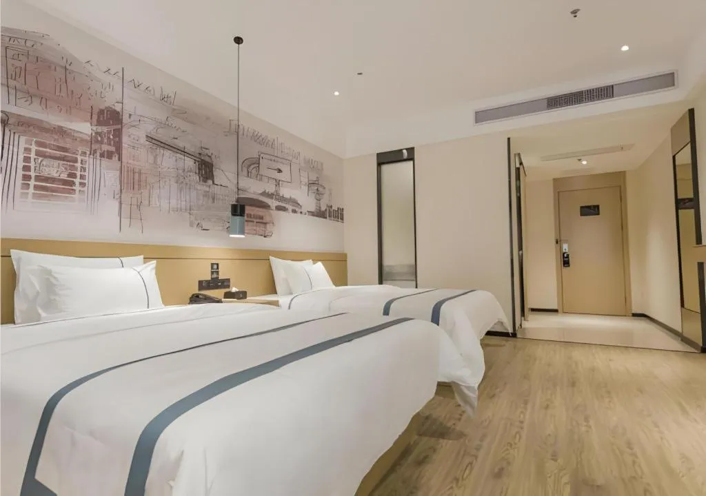 Bed in City Comfort Inn Foshan Shishan Square