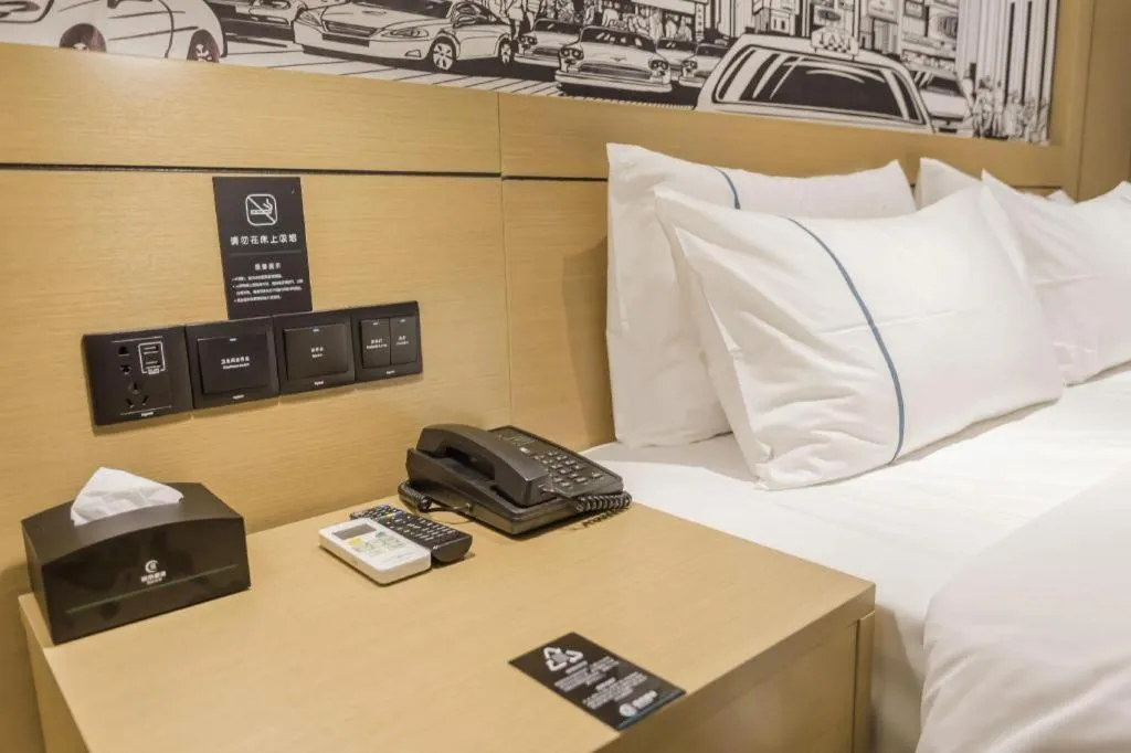 Bed in City Comfort Inn Foshan Shishan Square