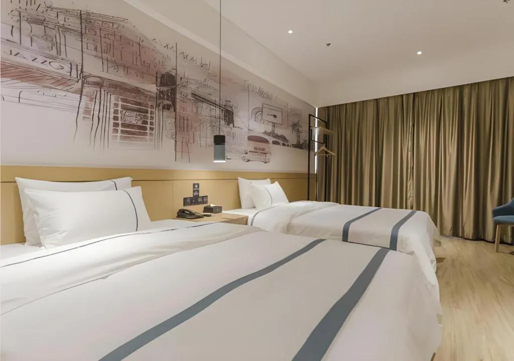 Bed in City Comfort Inn Foshan Shishan Square