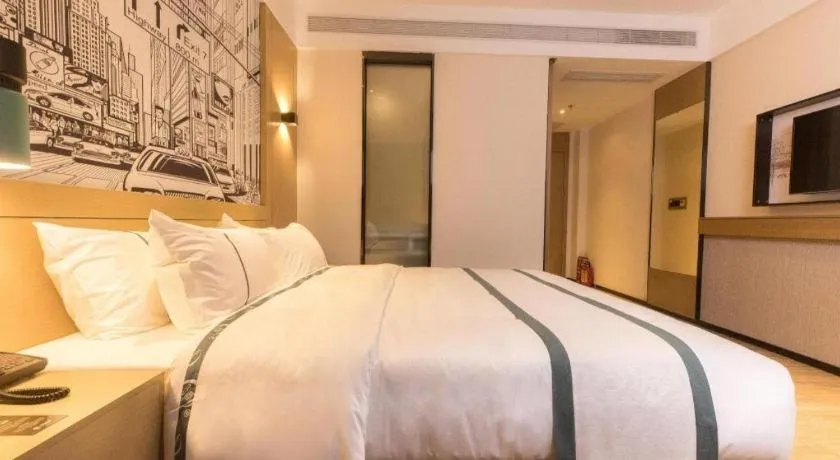 Bed in City Comfort Inn Foshan Shishan Square