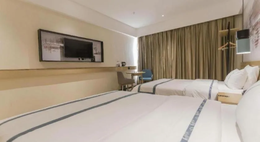 Bed in City Comfort Inn Foshan Shishan Square