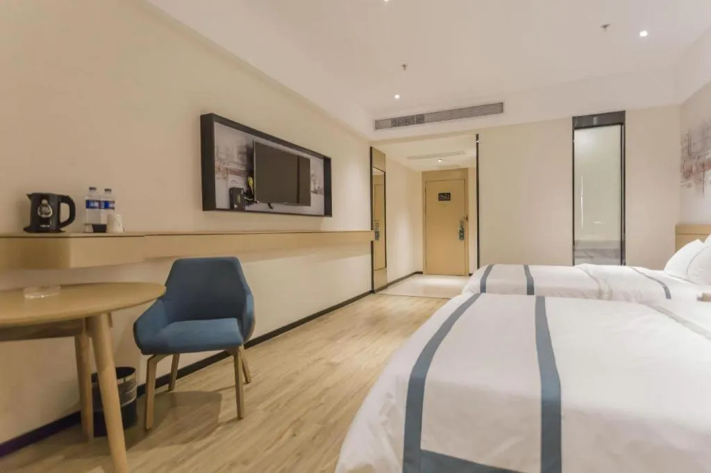 Bed in City Comfort Inn Foshan Shishan Square