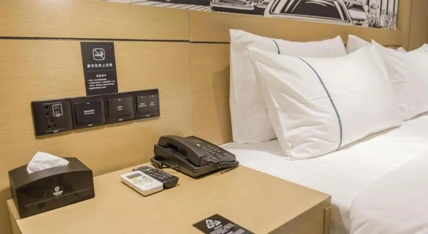 Bed in City Comfort Inn Foshan Shishan Square