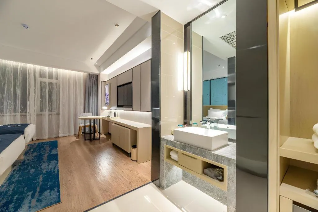 Bed in Echarm Hotel Tai'an Taishan Tianwai Village Hongmen