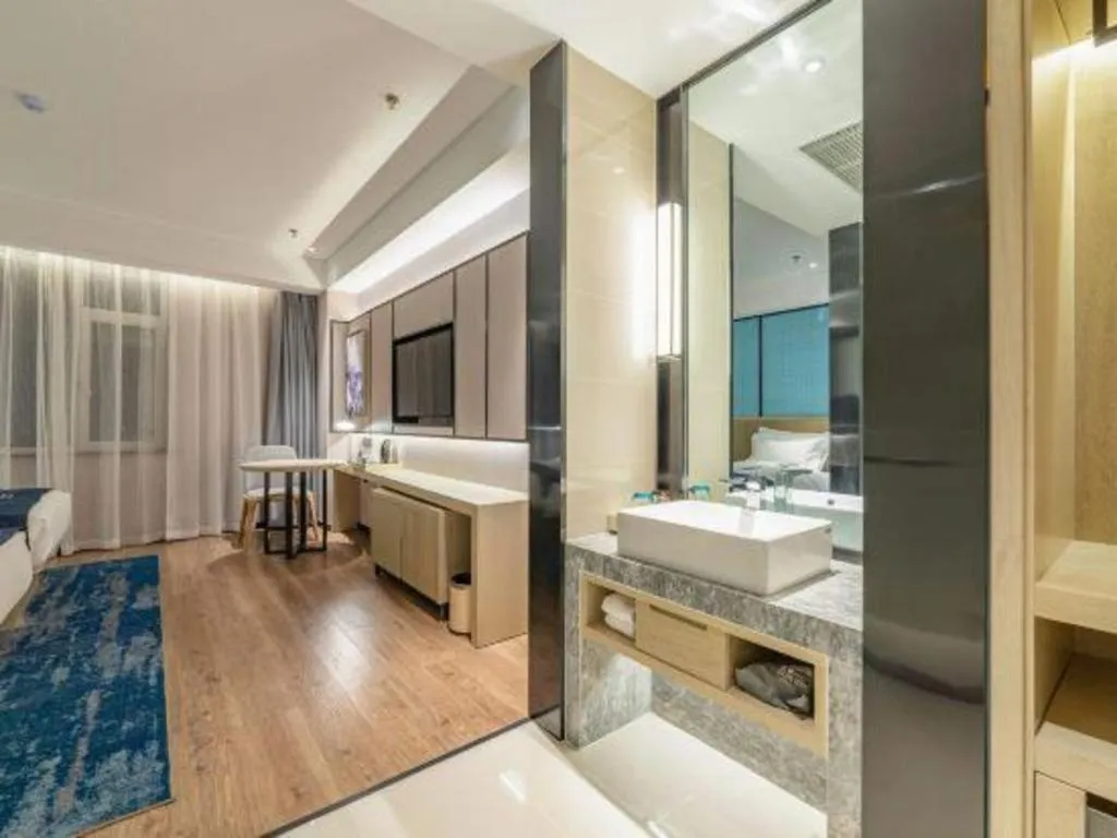 Bed in Echarm Hotel Tai'an Taishan Tianwai Village Hongmen