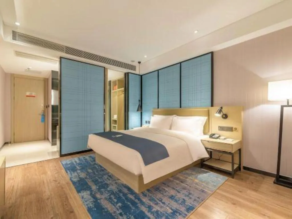 Bed in Echarm Hotel Tai'an Taishan Tianwai Village Hongmen