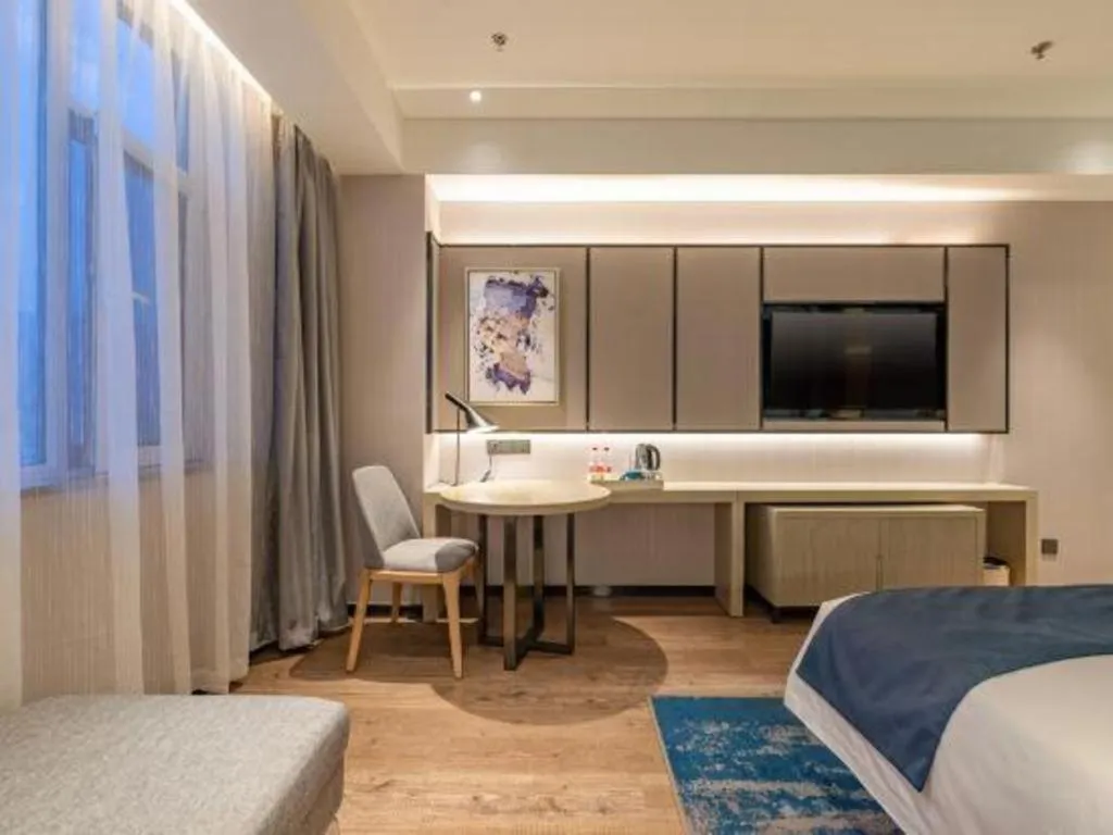 Bed in Echarm Hotel Tai'an Taishan Tianwai Village Hongmen