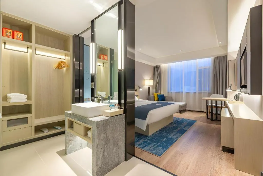 Bed in Echarm Hotel Tai'an Taishan Tianwai Village Hongmen