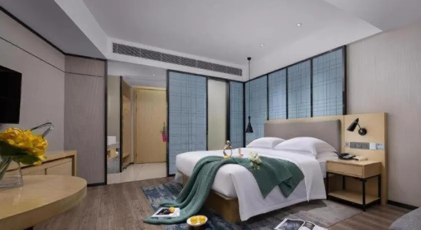 Bed in Echarm Hotel Tai'an Taishan Tianwai Village Hongmen